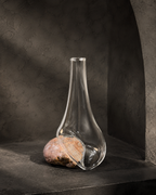 Stoneveil No. 004 one-of-one clear glass and coral-toned stone vase displayed empty
