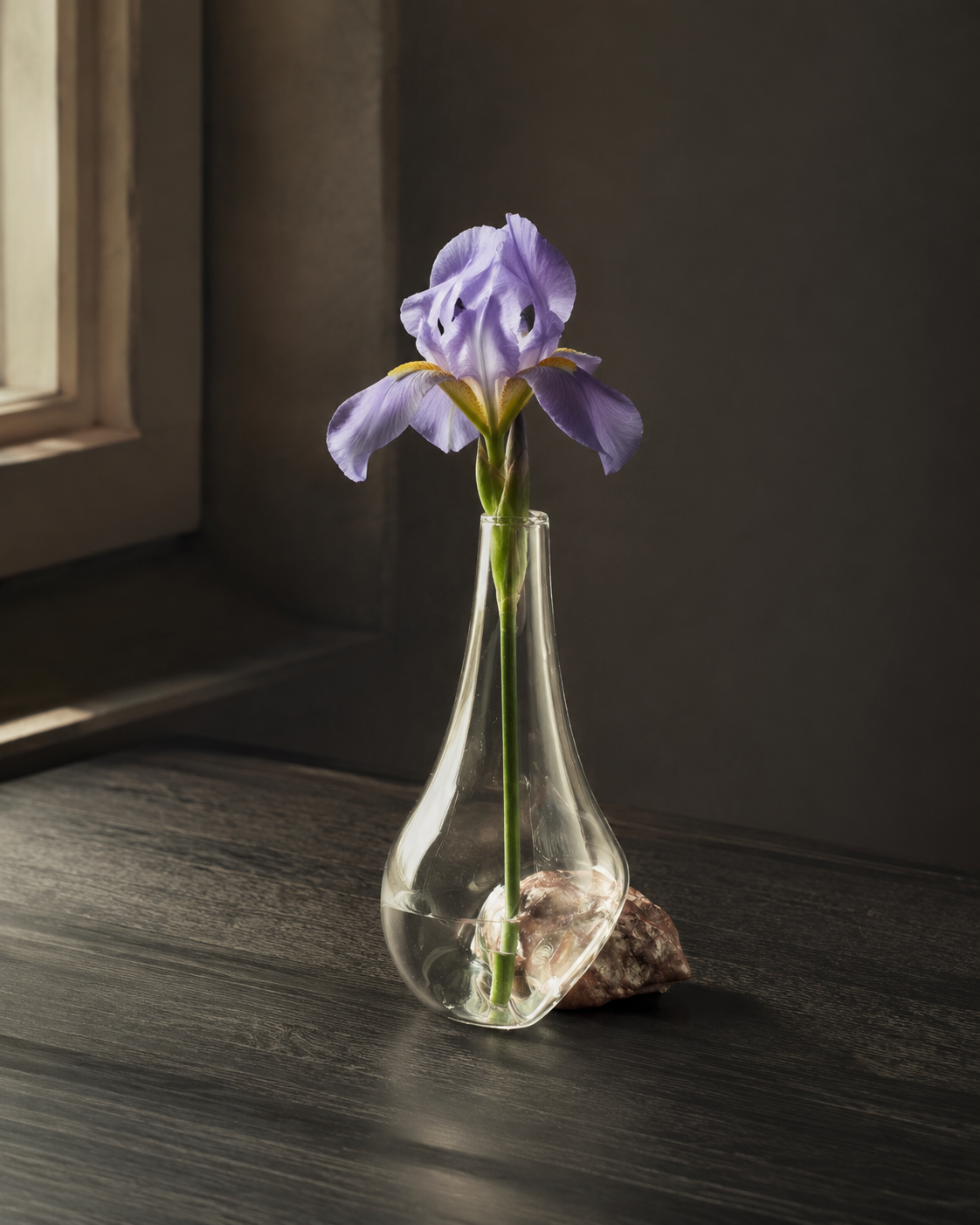 Stoneveil No. 006 clear glass and mauve stone bud vase styled with a lavender iris