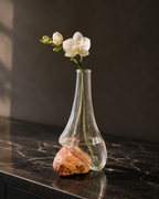 Stoneveil No. 004 clear glass and coral stone vase with a white miniature orchid