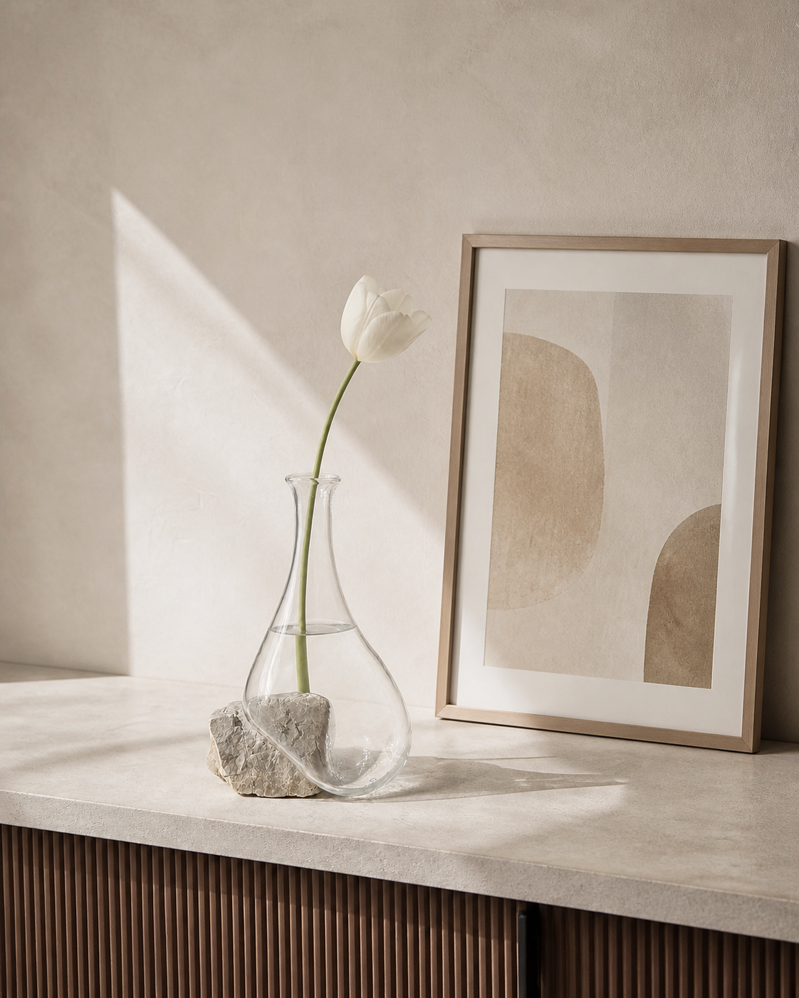 Stoneveil No. 002, a 20 cm glass and stone vase, styled with one ivory tulip on a console