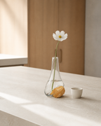 Small 16 cm Stoneveil No. 001 vase styled on a limestone breakfast island